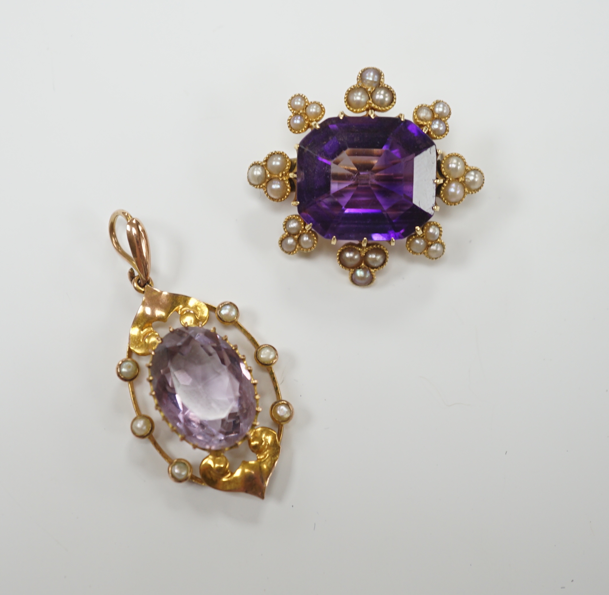 An early 20th century yellow metal, amethyst and seed pearl set brooch, 26mm and a similar pendant, gross weight 9.9 grams.